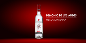 Bottle of Demonio de los Andes Pisco Acholado on a red background
