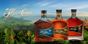 Flor de Caña Rum bottles for 12, 18 and 25 years with Nicaragua lanscape and mountain coasts in the background