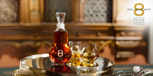 Massenez 8 pear liqueur elegant bottle on a luxury tray