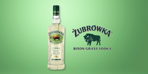 Zubrowka Bison Grass Vodka on green gradient background with logo