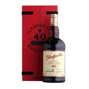 a bottle of Glenfarclas 40 Year Old Whisky with its red packaging box