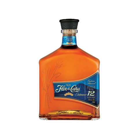 a bottle of Flor de Cana 12 centenario Rum with its blue label